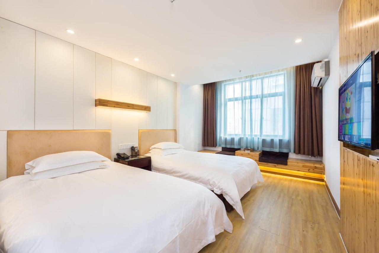 Omeiga Business Hotel Yiwu (Zhejiang) Exterior photo